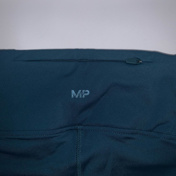 My Protein | Deep teal Velocity reflective sportswear leggings with phone pocket - Picture 6 of 10